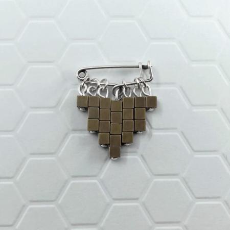 Broche Cubic bronze